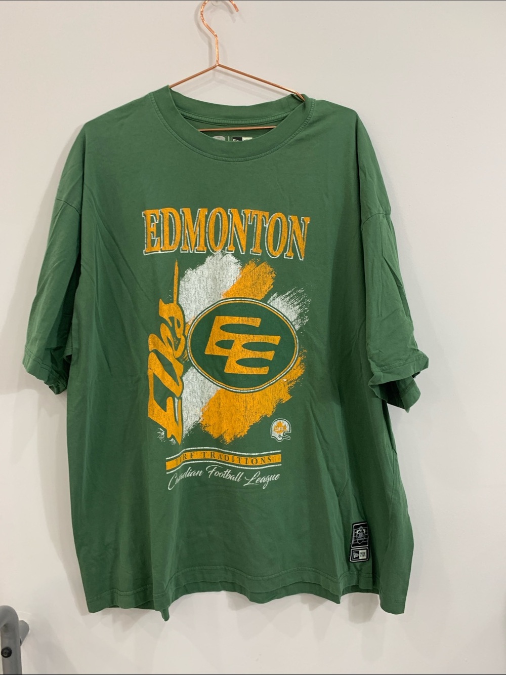 New Era Edmonton Green Graphic Tee with Yellow and White Print